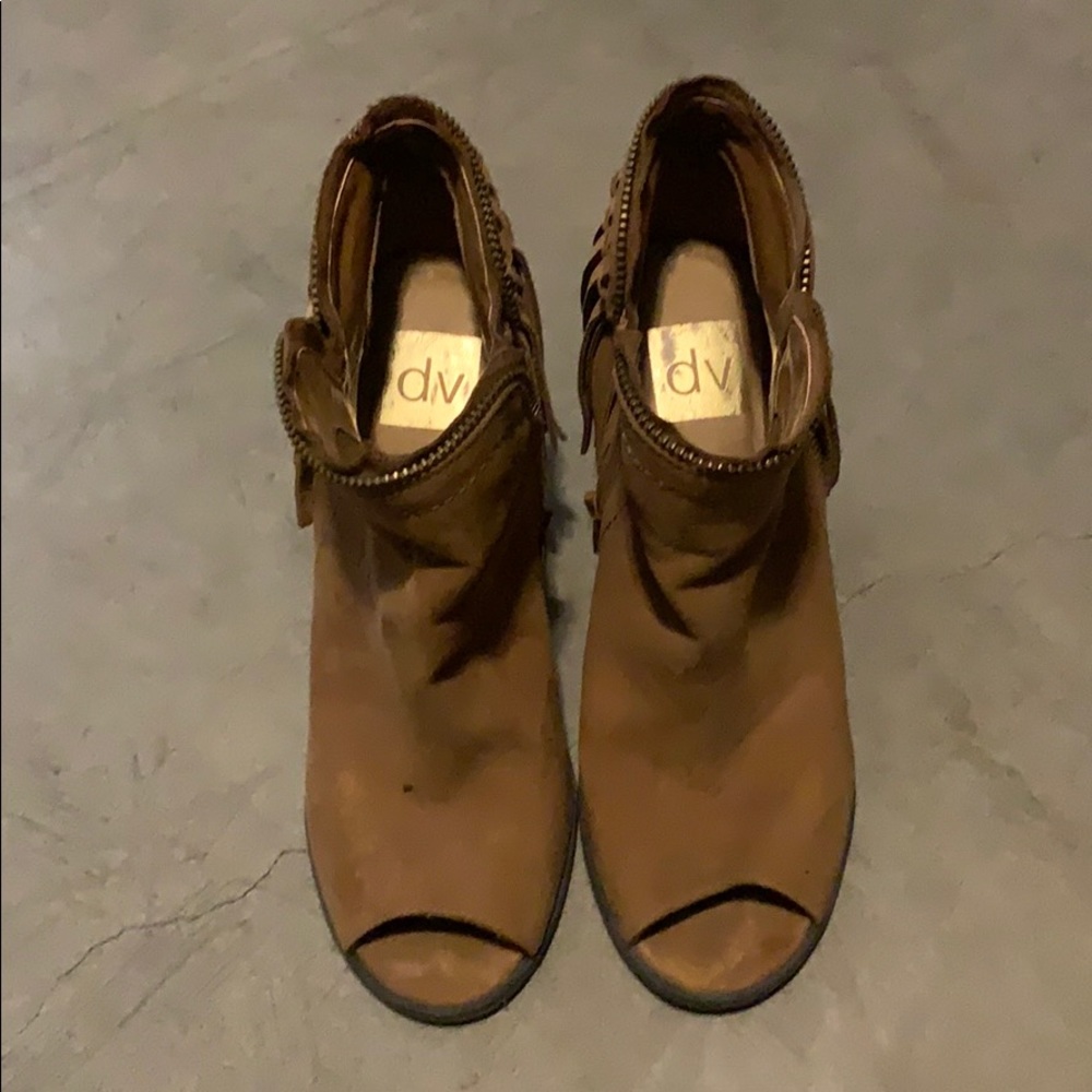 Brown fringe booties.